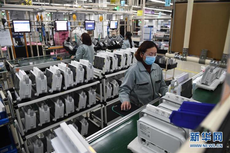 2月15日,在位于江苏无锡的通用电气医疗系统(中国),员工在